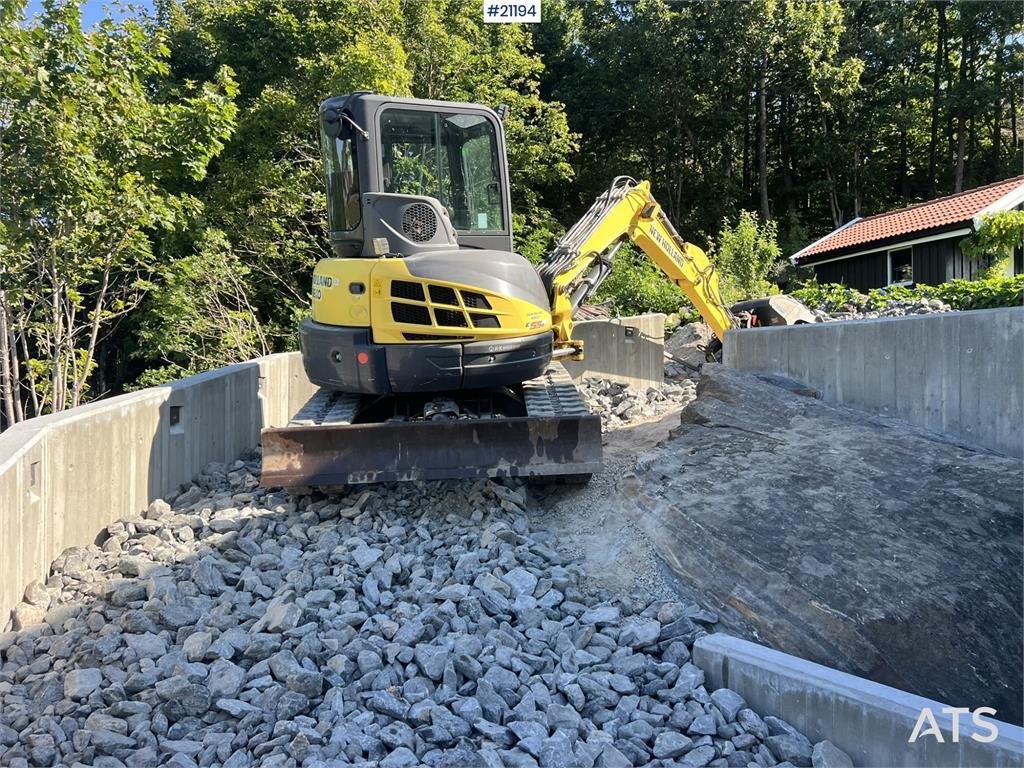 New Holland E55B excavator w/ digging bucket, sanding bucket, 2012 21194 E55B excavator w/ digging bucket, sanding bucket,...