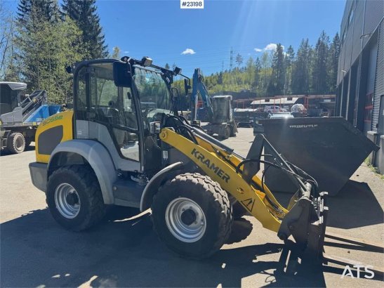 Kramer 5055E Wheel Loader with plow, pallet forks and 2 b Kramer 5055E Wheel Loader with plow, pallet forks and 2 b 2022 2...