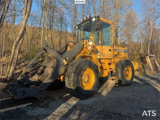 Volvo L50C wheel loader w/ 3 buckets, pallet forks, plow L50C wheel loader w/ 3 buckets, pallet forks, plow 1996 2 Wheel L...